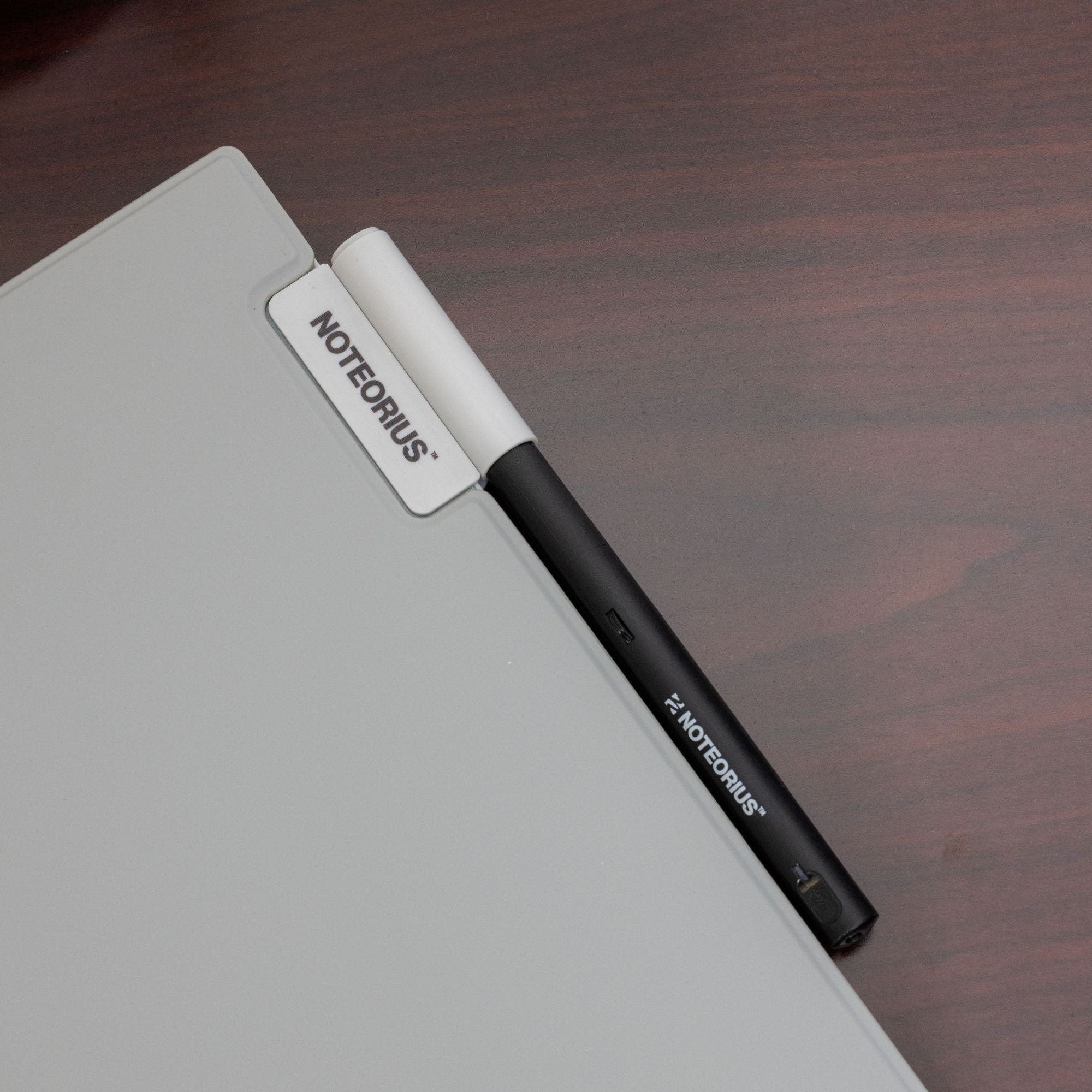 smart pen and digital notebook on desk