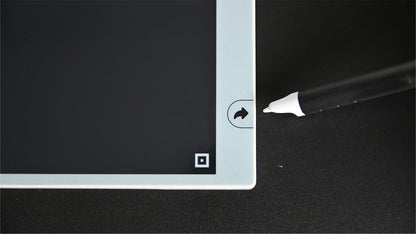 Digital smart notebook with stylus on a black background